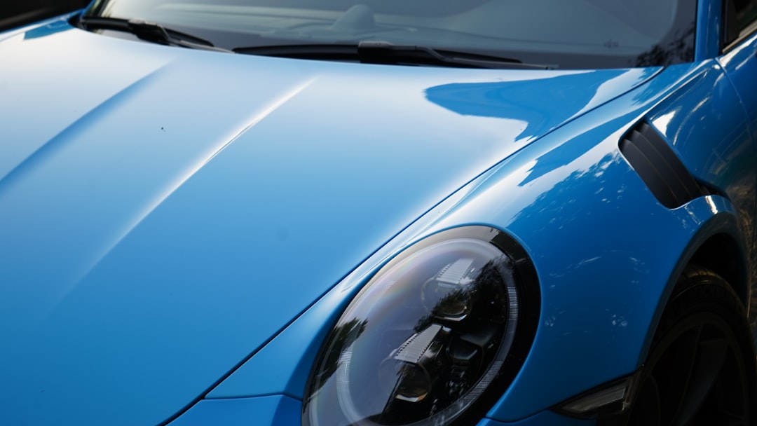 a-blue-car-with-a-white-stripe-vfi7z9avo8e